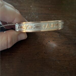 Intricate Gold Bracelet with Engraved Details